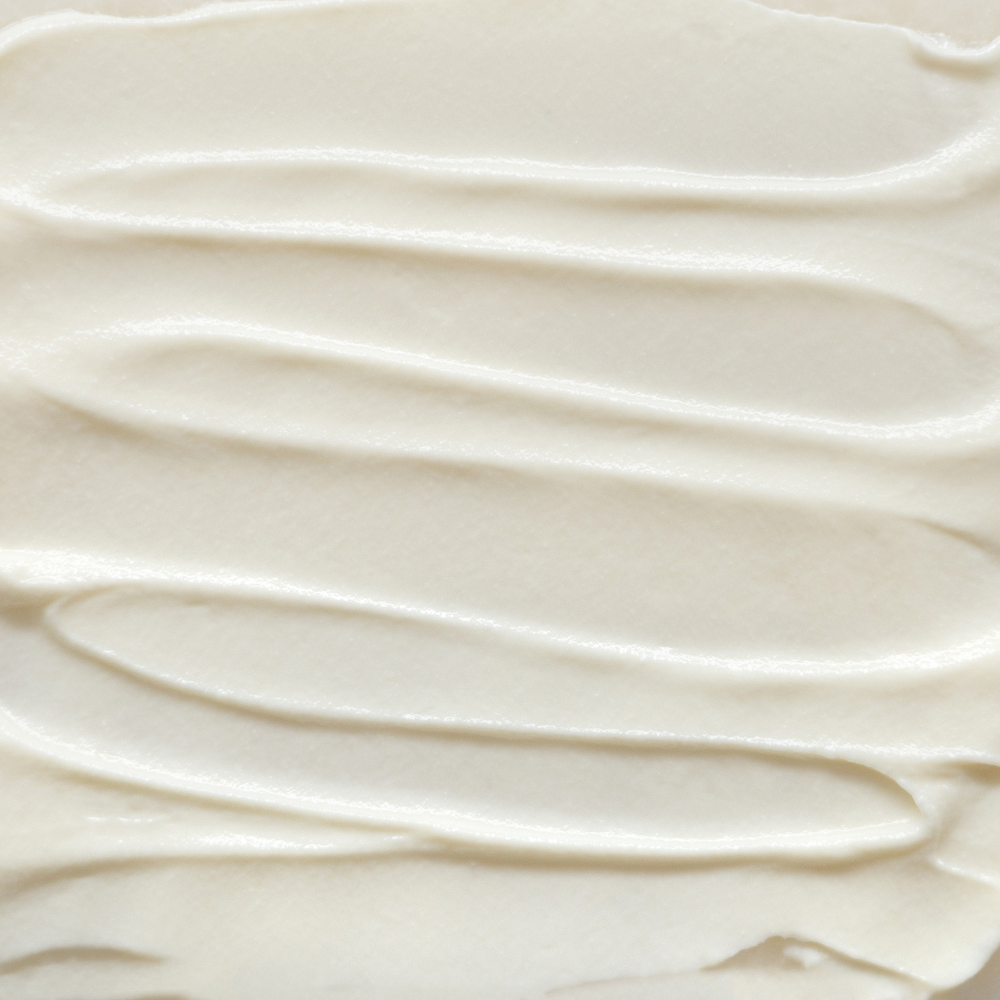 Close-up of Glory Cream smooth, beige cream texture 